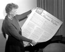 1 November 1949 United Nations, Lake Success, New York: Mrs. Eleanor Roosevelt (USA) holding the Universal Declaration of Human Rights as a poster in English.